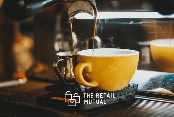 coffee pouring into yellow coffee cup