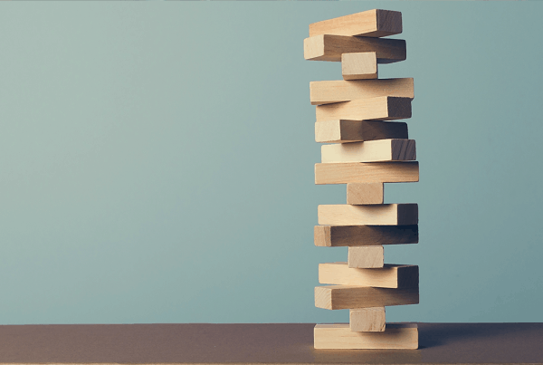 jenga tower blocks representing risks